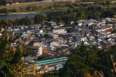 Kyoto panorama, Japan, beautiful super wide aerial view, with city skyline and mountains, seen from the observation deck in autumn fall sunny day with a blue sky, Kyoto prefecture, Kansai regionの写真素材