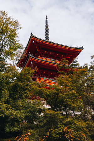 Kiyomizu-dera buddhist temple in Kyoto prefecture, Japan, Higashiyama ward, autumn fall view with mountains, Kyoto streets and skyline, shrine and pagoda, travel to Japan, Kansai regionの写真素材