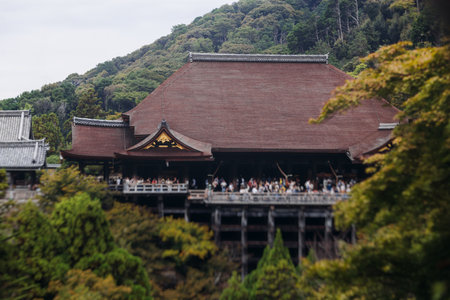 Kiyomizu-dera buddhist temple in Kyoto prefecture, Japan, Higashiyama ward, autumn fall view with mountains, Kyoto streets and skyline, shrine and pagoda, travel to Japan, Kansai regionの写真素材