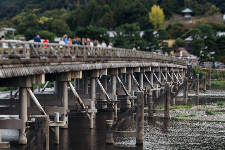 Arashiyama district panorama in western Kyoto, Japan, with boats and mountain Arashi, Togetsukyo...