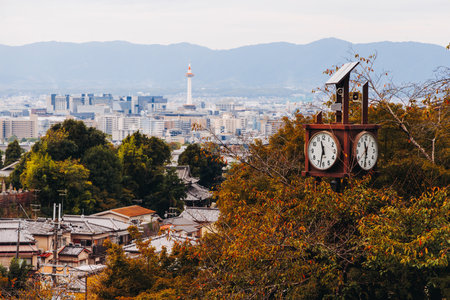 Kyoto panorama, Japan, beautiful super wide aerial view, with city skyline and mountains, seen from the observation deck in autumn fall sunny day with a blue sky, Kyoto prefecture, Kansai regionの写真素材