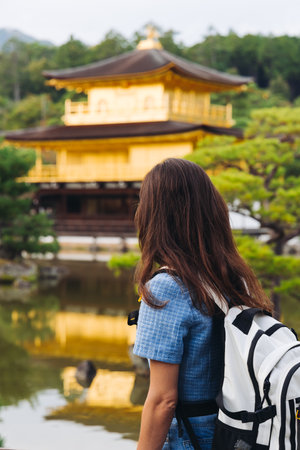 Kinkaku-ji temple golden pavilion, Golden Pavillon garden in Kyoto, Rokuon-ji zen buddhist temple, Deer Garden temple, Japan, Kita-ku Kita ward, autumn fall view, with reflection in a pond, travel to Japanの写真素材