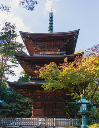 Gotokuji Temple in fall sunny day, Daikeizan Gotoku-ji in Setagaya ward, Tokyo, Japan, buddhist temple, Maneki-neko temple, with beckoning cat figurine toys, temple with Japanese fortune lucky catsの写真素材
