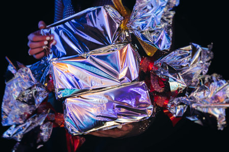 Award ceremony, contest winners receive prizes and presents on stage, guests and contestants gift package, gift giving at work, corporate gifts box, souvenirs and reward for company best employeesの写真素材