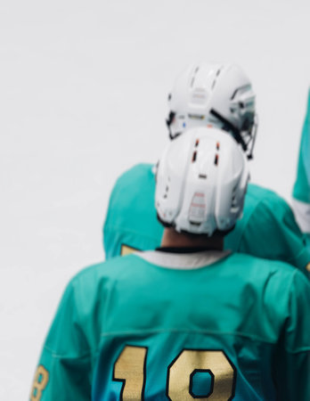Hockey match game on ice rink arena stadium, team of ice hockey professional players with coach, stick and puck, team of hockey players in protective sport uniform training, hockey league championshipの写真素材