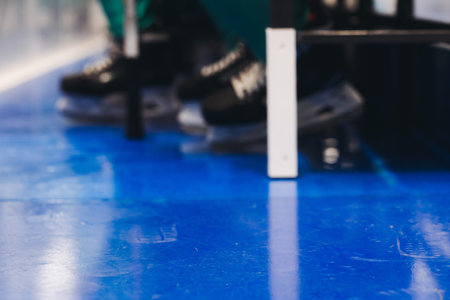 Hockey match game on ice rink arena stadium, team of ice hockey professional players with coach, stick and puck, team of hockey players in protective sport uniform training, hockey league championshipの写真素材