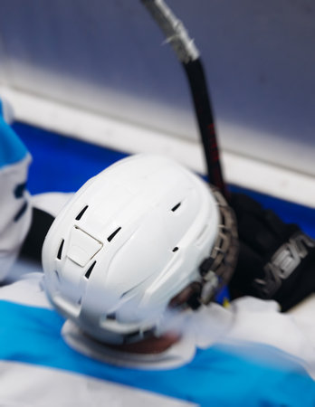 Hockey match game on ice rink arena stadium, team of ice hockey professional players with coach, stick and puck, team of hockey players in protective sport uniform training, hockey league championshipの写真素材
