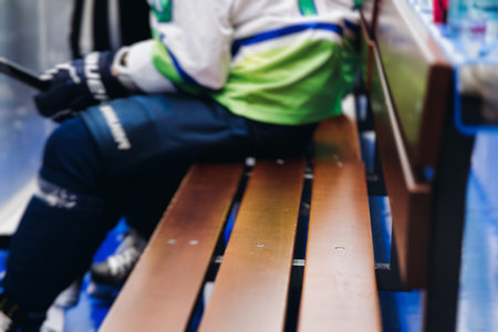 Hockey match game on ice rink arena stadium, team of ice hockey professional players with coach, stick and puck, team of hockey players in protective sport uniform training, hockey league championshipの写真素材