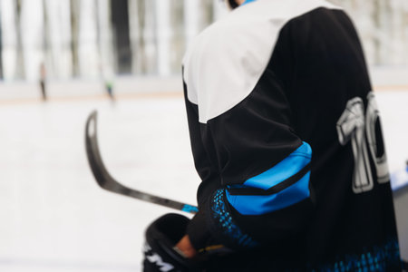 Hockey match game on ice rink arena stadium, team of ice hockey professional players with coach, stick and puck, team of hockey players in protective sport uniform training, hockey league championshipの写真素材