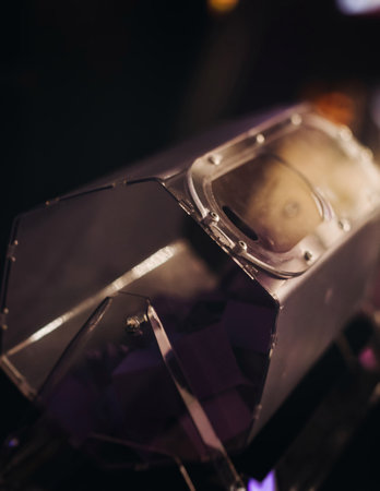 Process of prize drawings, extracting a winning numbers of lottery machine, raffle drum with a bingo balls, bingo machine and purple violet winning tickets on event, hands on lottery machineの写真素材