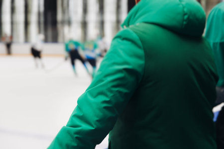 Hockey match game on ice rink arena stadium, team of ice hockey professional players with coach, stick and puck, team of hockey players in protective sport uniform training, hockey league championshipの写真素材