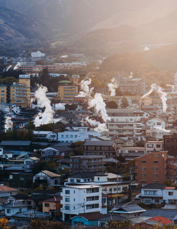 Beppu, Japan, city panorama skyline, Kannawa onsen distict, Oita prefecture, Kyushu island region,, Yukemuri observation deck, rising hot steam from onsen ryokan bath houses, Beppu resort hot springsの写真素材