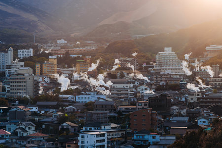Beppu, Japan, city panorama skyline, Kannawa onsen distict, Oita prefecture, Kyushu island region,, Yukemuri observation deck, rising hot steam from onsen ryokan bath houses, Beppu resort hot springsの写真素材