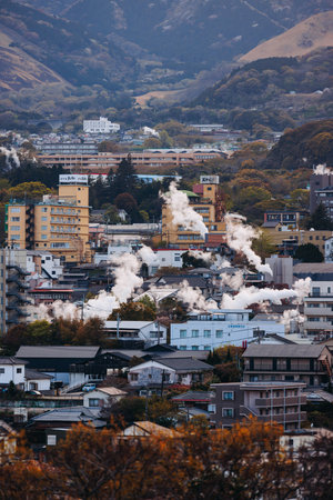 Beppu, Japan, city panorama skyline, Kannawa onsen distict, Oita prefecture, Kyushu island region,, Yukemuri observation deck, rising hot steam from onsen ryokan bath houses, Beppu resort hot springsの写真素材