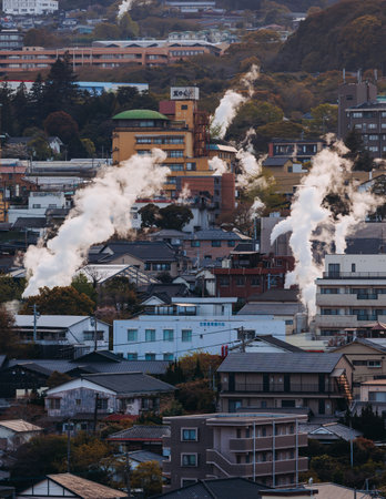 Beppu, Japan, city panorama skyline, Kannawa onsen distict, Oita prefecture, Kyushu island region,, Yukemuri observation deck, rising hot steam from onsen ryokan bath houses, Beppu resort hot springsの写真素材