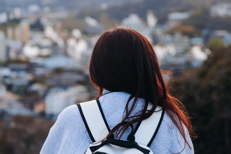 Beppu, Japan, city panorama skyline, Kannawa onsen distict, Oita prefecture, Kyushu island region, Yukemuri observation deck, rising hot steam from onsen ryokan bath houses, Beppu resort hot springsの写真素材