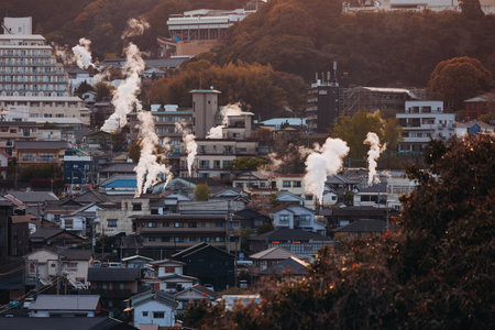 Beppu, Japan, city panorama skyline, Kannawa onsen distict, Oita prefecture, Kyushu island region,, Yukemuri observation deck, rising hot steam from onsen ryokan bath houses, Beppu resort hot springsの写真素材