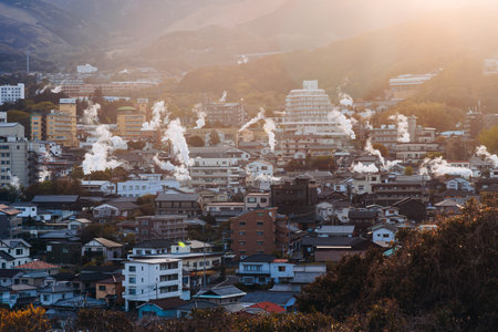 Beppu, Japan, city panorama skyline, Kannawa onsen distict, Oita prefecture, Kyushu island region,, Yukemuri observation deck, rising hot steam from onsen ryokan bath houses, Beppu resort hot springsの写真素材
