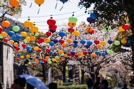 Glover Garden in Nagasaki, Japan, Minamiyamate hill, beautiful park view, with city skyline and cherry sakura blossom, in a spring sunny day with a blue sky, Nagasaki prefecture, Kyushu island regionの写真素材