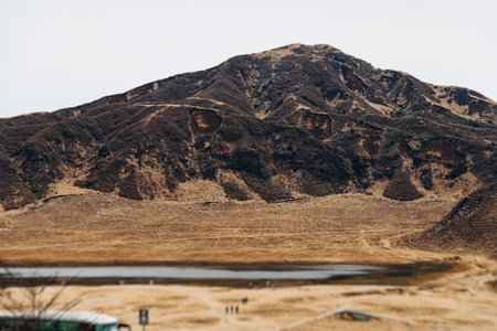 Kusasenri landscape, Kusasenrigahama, Mount Aso and Komezuka volcano, Nakadake peak, Aso-Kuju National Park hiking, Kyushu island region, Kumamoto prefecture, Japan, volcanic desert viewの写真素材