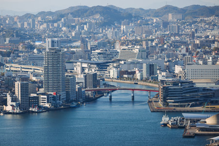Nagasaki panorama, Japan, beautiful aerial view, with city skyline, port and mountains, seen from...