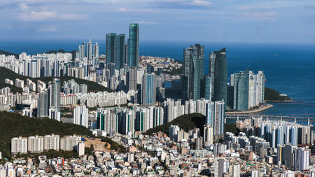 Busan city panorama beautiful skyline view from Hwangnyeongsan mountain observatory, Busan port, Gwangan bridge and harbor bay, South Korea, Yeongnam district, sunny day, travel to Republic of Koreaの写真素材