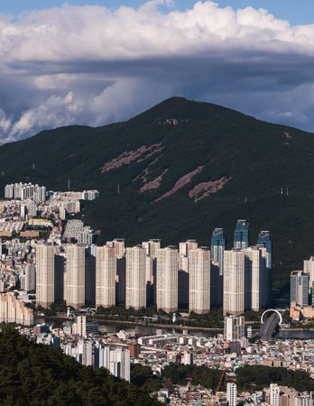 Busan city panorama beautiful skyline view from Hwangnyeongsan mountain observatory, sunny day, travel to South Koreaの写真素材