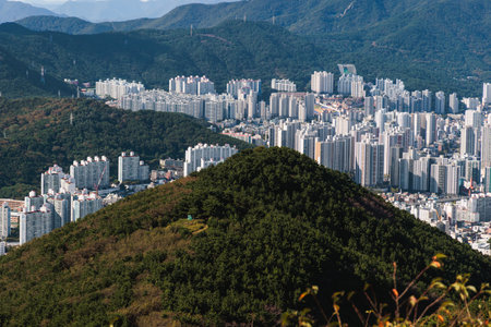 Busan city panorama beautiful skyline view from Hwangnyeongsan mountain observatory, Gwangan bridge and harbor bay, South Korea, sunny dayの写真素材
