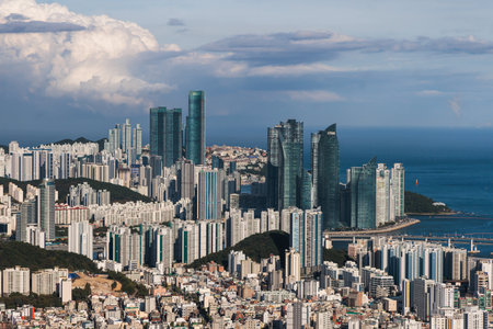Busan city panorama beautiful skyline view from Hwangnyeongsan mountain observatory, Busan port, Gwangan bridge and harbor bay, South Korea, Yeongnam district, sunny day, travel to Republic of Koreaの写真素材