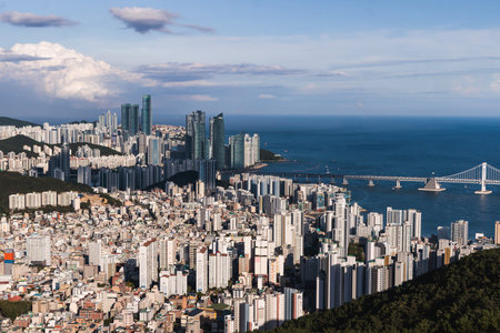 Busan city panorama beautiful skyline view from Hwangnyeongsan mountain observatory, Busan port, Gwangan bridge and harbor bay, South Korea, Yeongnam district, sunny day, travel to Republic of Koreaの写真素材