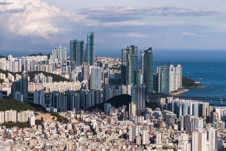 Busan city panorama beautiful skyline view from Hwangnyeongsan mountain observatory, Busan port, Gwangan bridge and harbor bay, South Korea, Yeongnam district, sunny day, travel to Republic of Koreaの写真素材