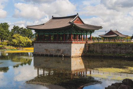 Gyeongju, South Korea, view of Donggung Palace and Wolji Pond in a sunny day, North Gyeongsang Province, Gyeongju city, Silla dinasty traditional Korean hanok architecture, Yeongnam regionの写真素材