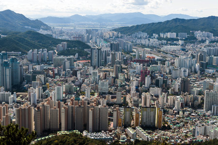 Busan city panorama beautiful skyline view from Hwangnyeongsan mountain observatory, Busan port,...
