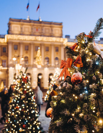 New Year and Christmas in Russia, glowing decor decoration in a winter snowy street, with night decor illumination, city outdoor decorations, Saint-Petersburg, christmas tree and garland lightの写真素材