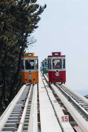 Haeundae Blue Line Park, Busan, ride on multicolored sky capsule train, railway tram route from Mipo to Cheongsapo station, coastal monorail in Busan, Yeongnam, South Korea, Republic of Korea travelの写真素材