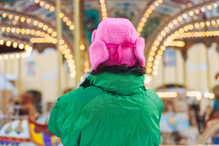 Christmas market with illuminated food stalls, gift shops and kiosks, New Year outdoor fair...