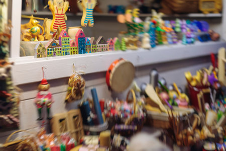 Christmas market with illuminated food stalls, gift shops and kiosks, New Year outdoor fair...
