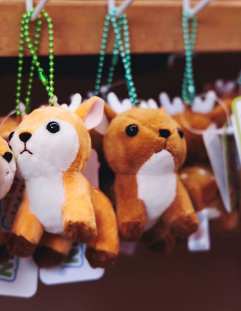 Japanese tourist souvenirs, presents and travel gifts from Nara, Japan, spotted deer figures, key...