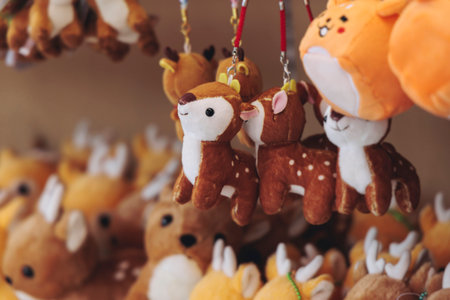 Japanese tourist souvenirs, presents and travel gifts from Nara, Japan, spotted deer figures, key...