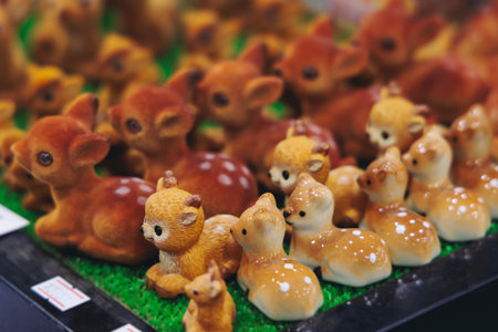 Japanese tourist souvenirs, presents and travel gifts from Nara, Japan, spotted deer figures, key...