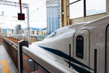 High speed japanese bullet train, Shinkansen arrival at station, high-speed railway lines, Japan,...