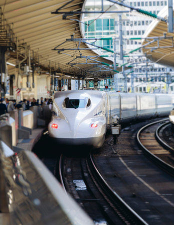 High speed japanese bullet train, Shinkansen arrival at station, high-speed railway lines, Japan,...