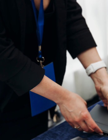 Process of checking in on conference congress forum event, registration desk table, visitors and...