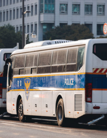 South Korean Police car and bus with Police logo, police cars and buses parked in government area of...