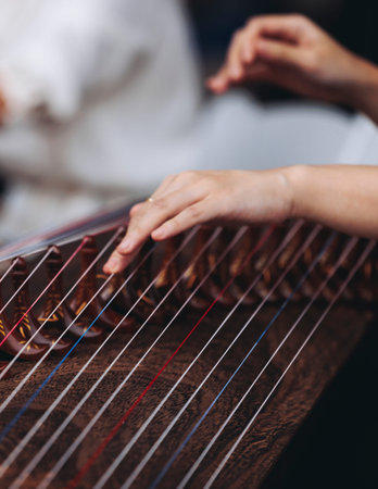 Traditional Korean folk musical instrument Gayageum, female orchestra band performing concert on...