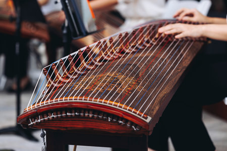 Traditional Korean folk musical instrument Gayageum, female orchestra band performing concert on...