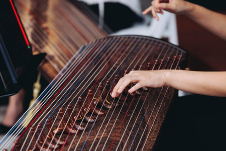 Traditional Korean folk musical instrument Gayageum, female orchestra band performing concert on...