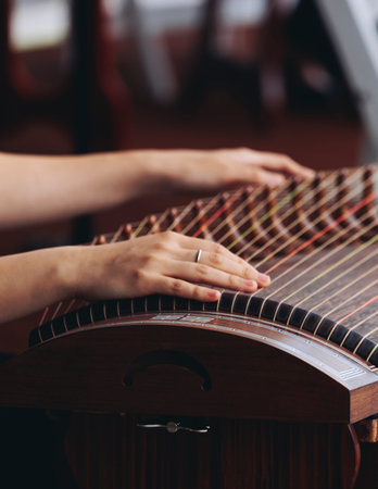 Traditional Korean folk musical instrument Gayageum, female orchestra band performing concert on...