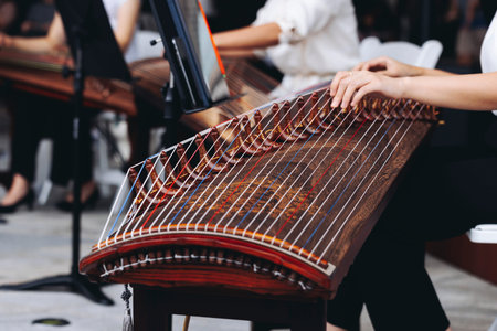 Traditional Korean folk musical instrument Gayageum, female orchestra band performing concert on...