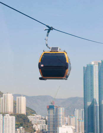 Busan Air Cruise, Busan cable car, ride on multicoloured sky capsule gondola route, with Songdo beach and Skywalk and Busan Bay panorama, South Korea, Songdo Station in a spring sunny day